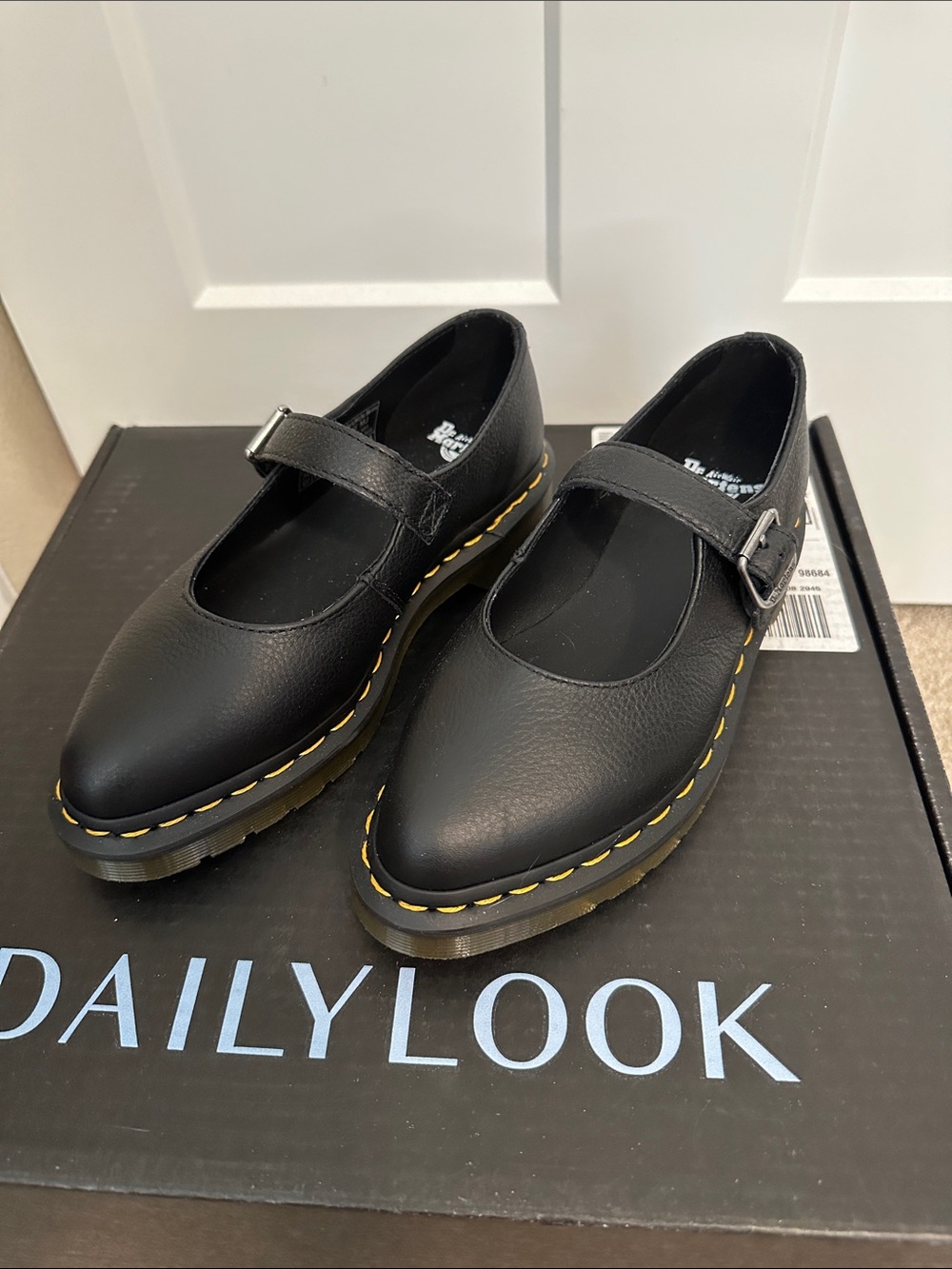 Dr. Martens Black Mary Jane Shoes with Yellow Stitching